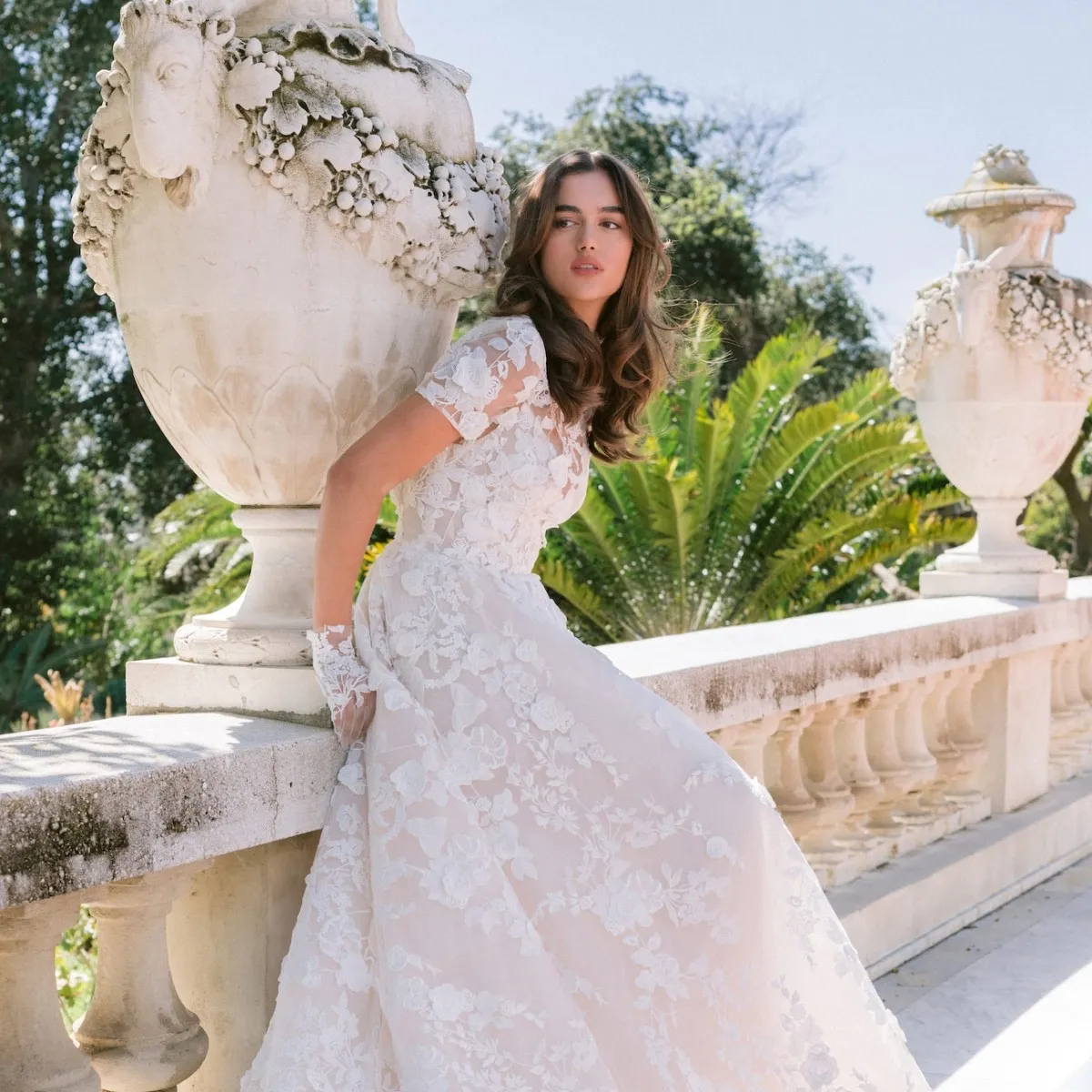 Bridal Fashion Week: A bride standing in an ornate wedding gown by Monique Lhuillier.