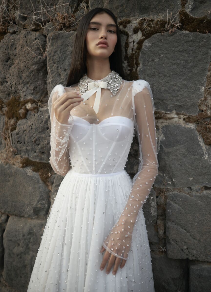 Bridal style Christie Nicole Bridal over-the-top gown with sheer lace bodice and jeweled collar