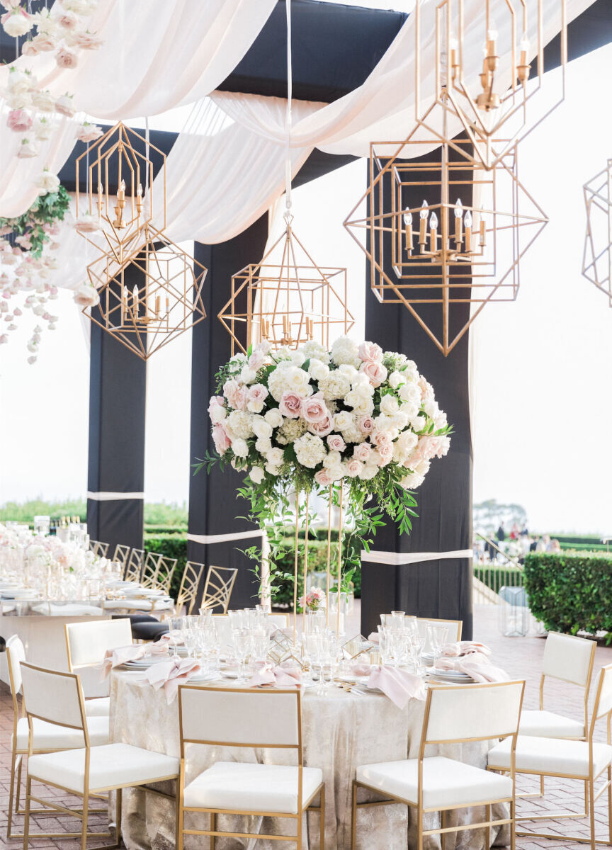 Ceiling Wedding Decor: White fabric draped over an outdoor reception structure at a wedding in California.