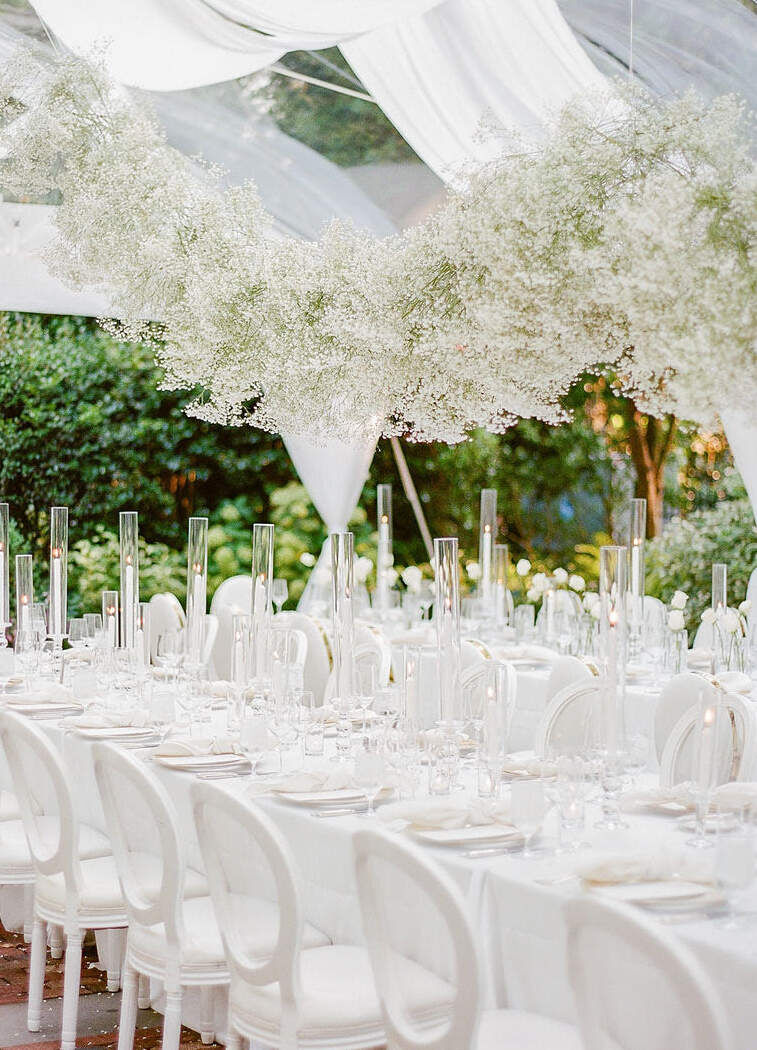 Ceiling Wedding Decor: A white baby's breath hanging floral arrangement.