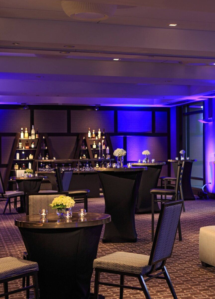 City Weddings: An indoor wedding reception setup at Renaissance Seattle.