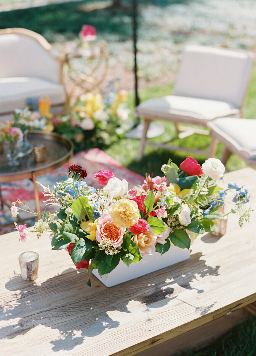 Colorful flowers set the scene of the mehndi that kicked off a destination Indian wedding weekend in North Carolina.