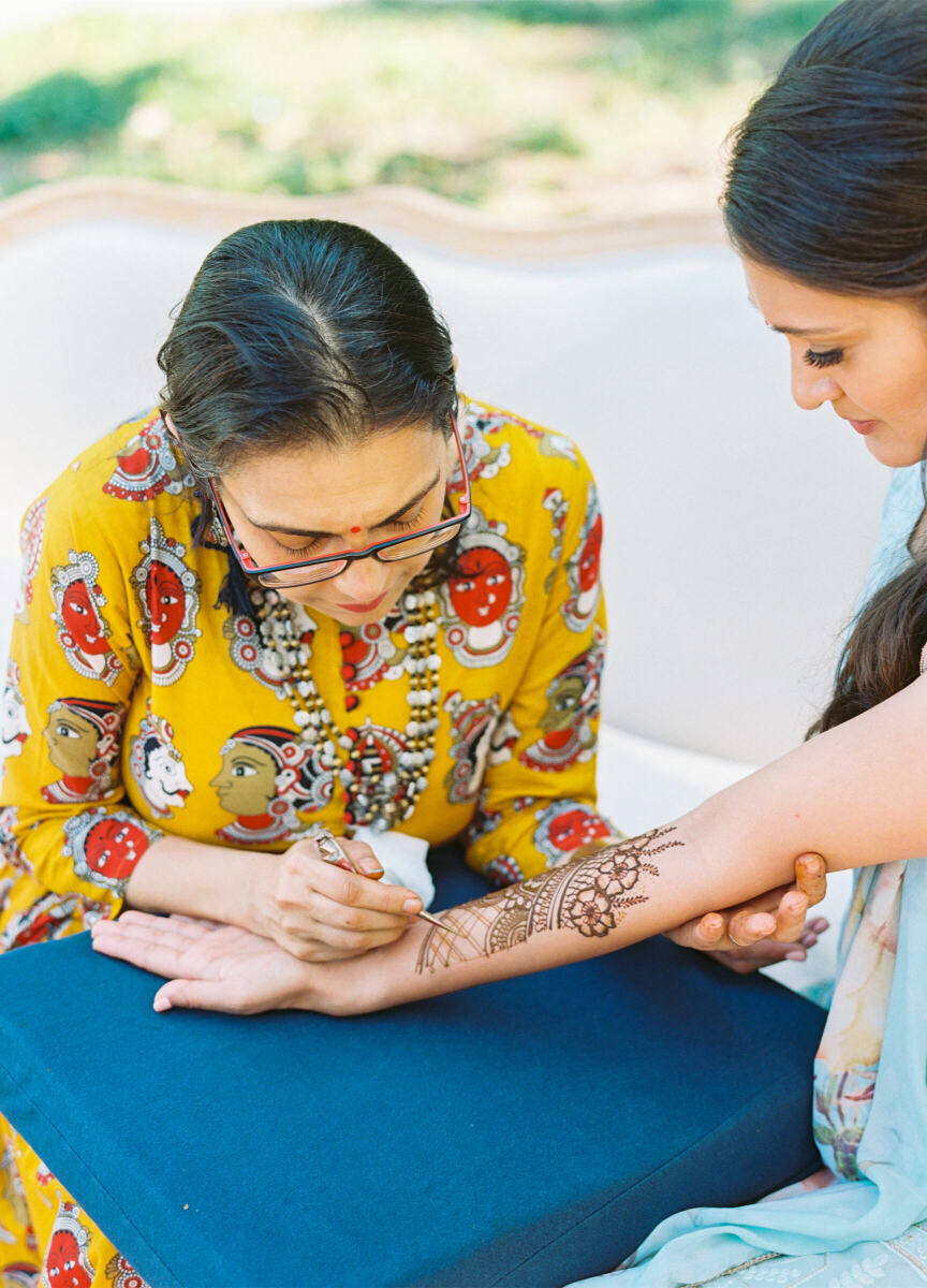 A henna artist was present for some of the events that transpired over the weekend of this destination Indian wedding.