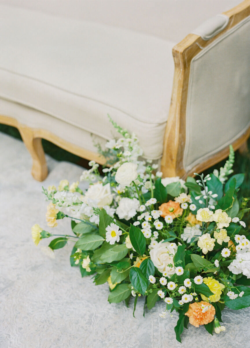 White, peach, and yellow flowers were used for the engagement ceremony during a destination Indian wedding weekend.