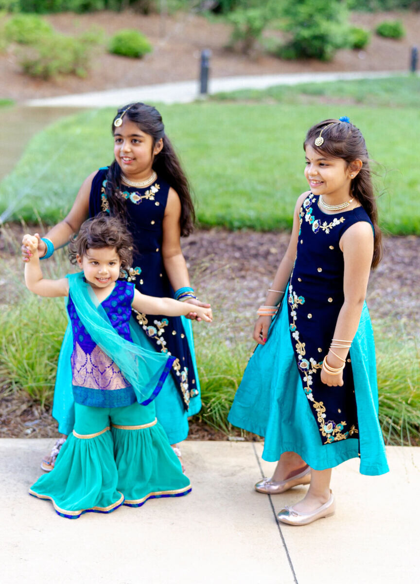 Young guests wore colorful ensembles throughout a destination Indian wedding weekend.