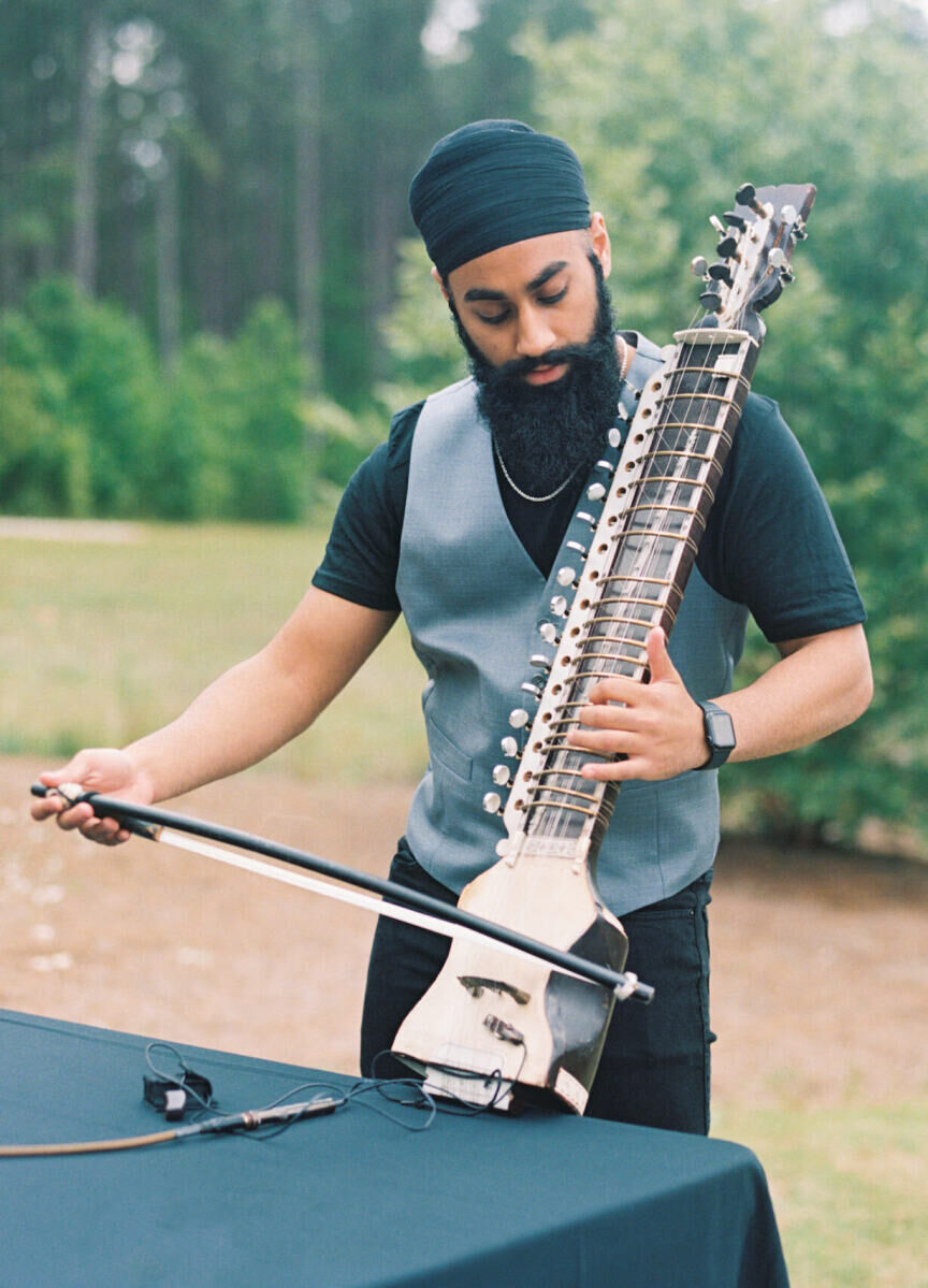 Traditional music played during the cocktail hour and reception of this destination Indian wedding.