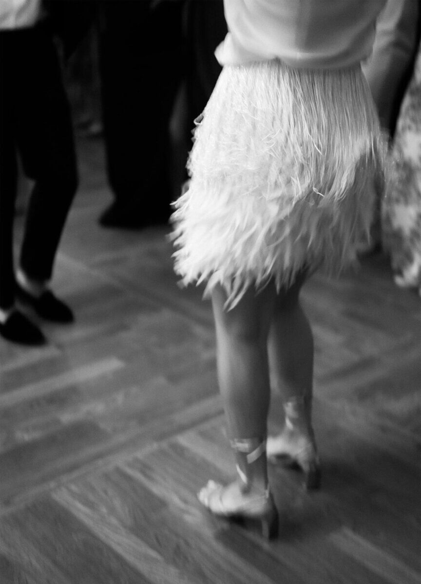 The bride changed into a textured skirt to dance the night away during her elevated garden wedding.