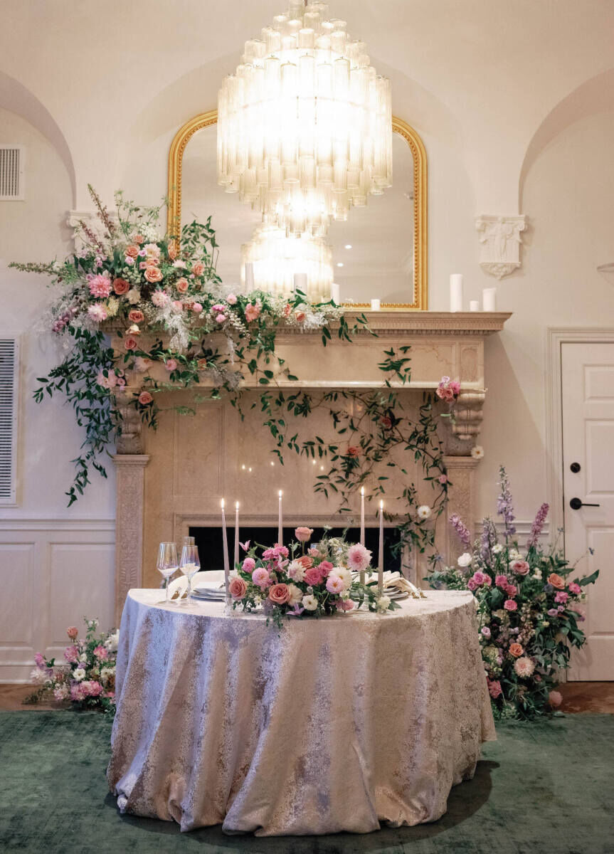 A sweetheart table set in the suite of a hotel during an elopement wedding.