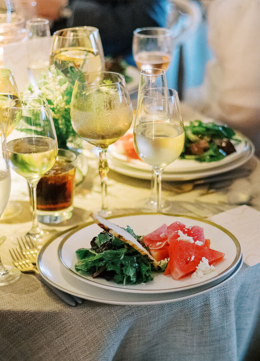 Dinner at an enchanted waterfront wedding began with a watermelon and feta salad.