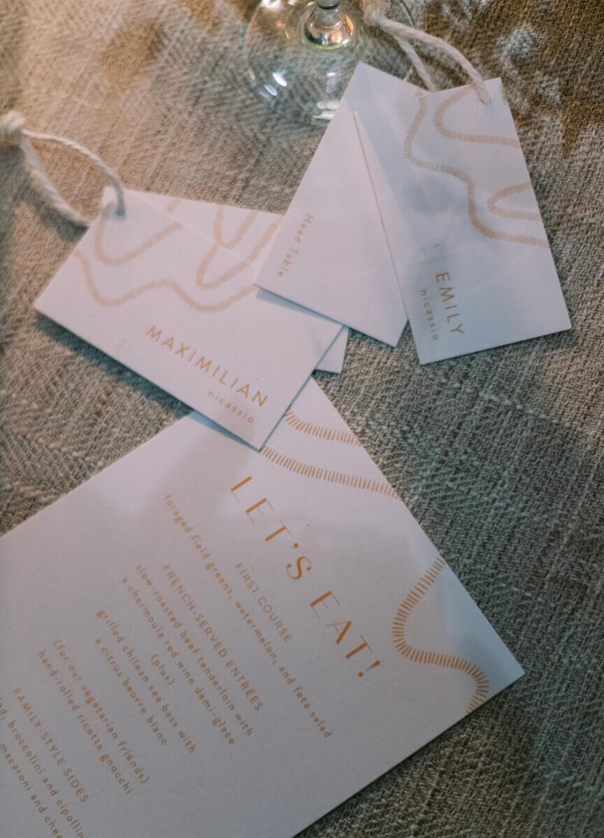 The bride designed all of the stationery at her enchanted waterfront wedding, including place cards and menus that read 