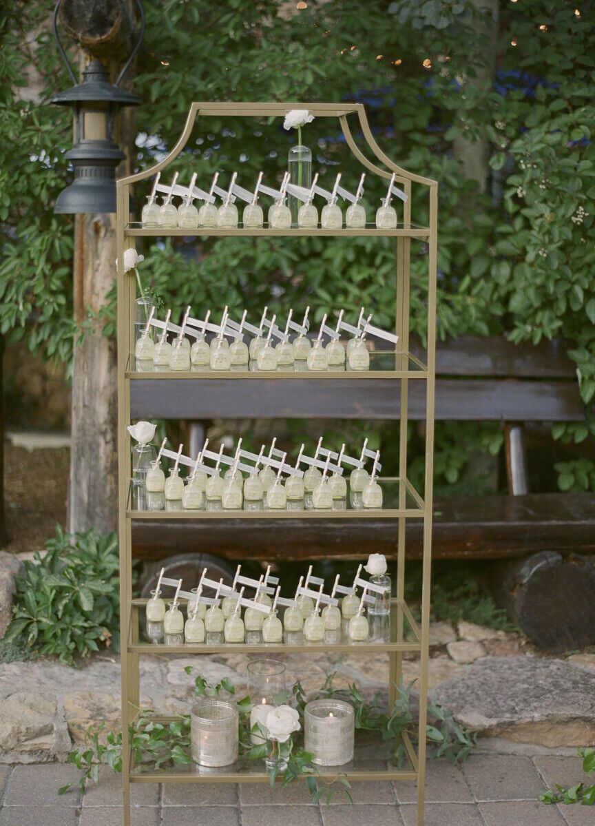 Escort card displays: See more from Jamie and Elliot's classic wedding