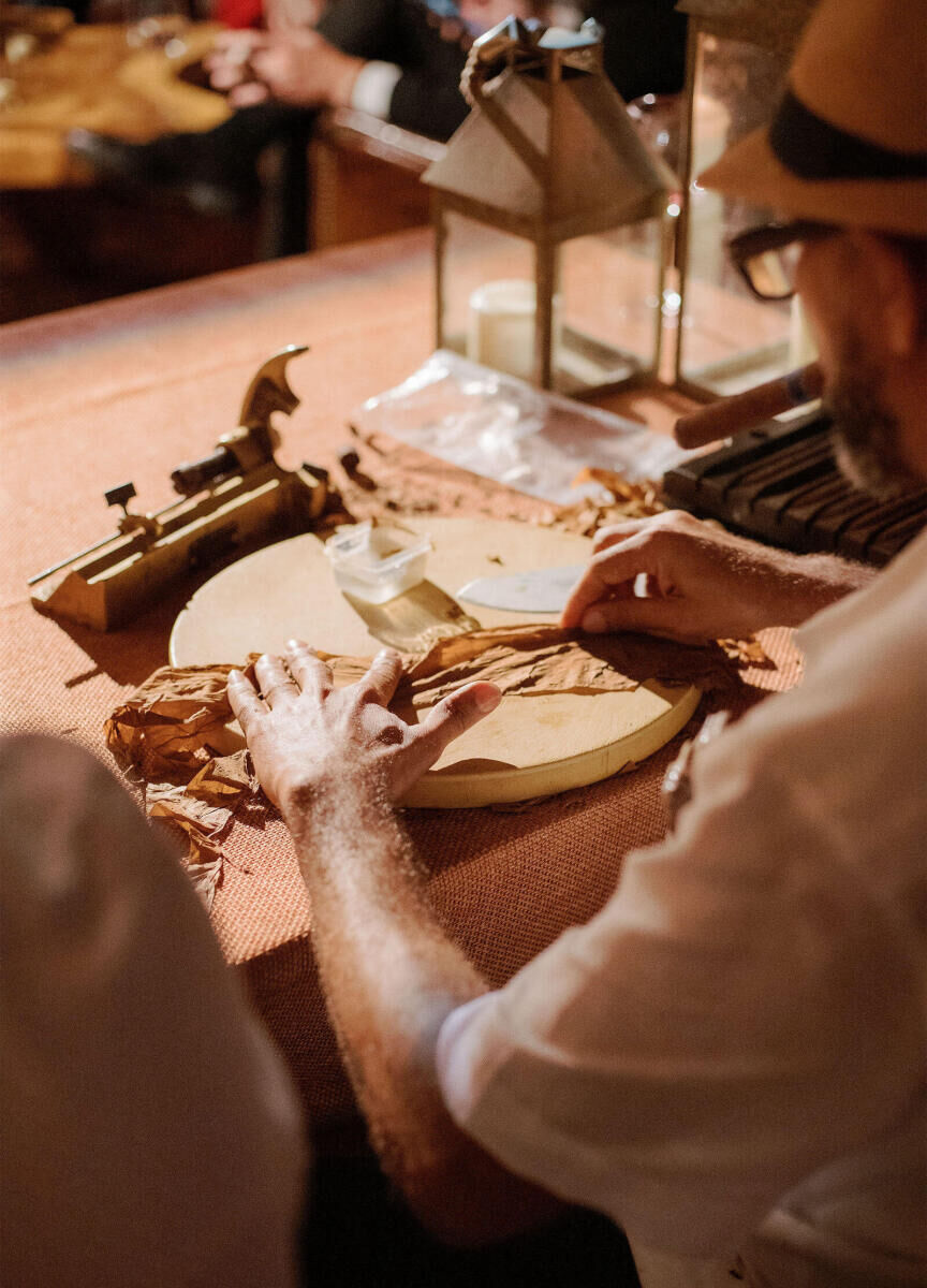 A cigar roller added a special touch to the reception of a Glenmere Mansion wedding.