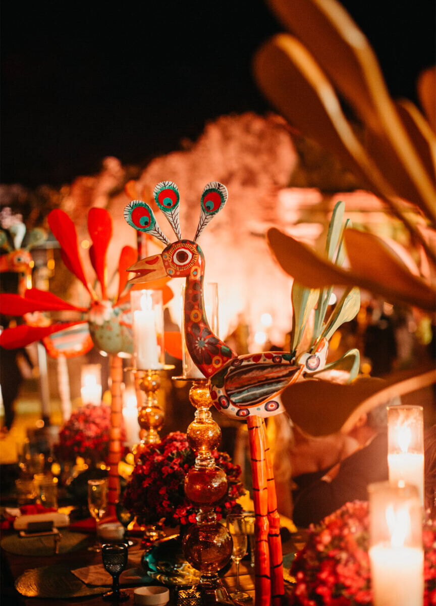 Latinx Heritage: A wooden bird figurine on a reception table at a wedding in Guatemala.