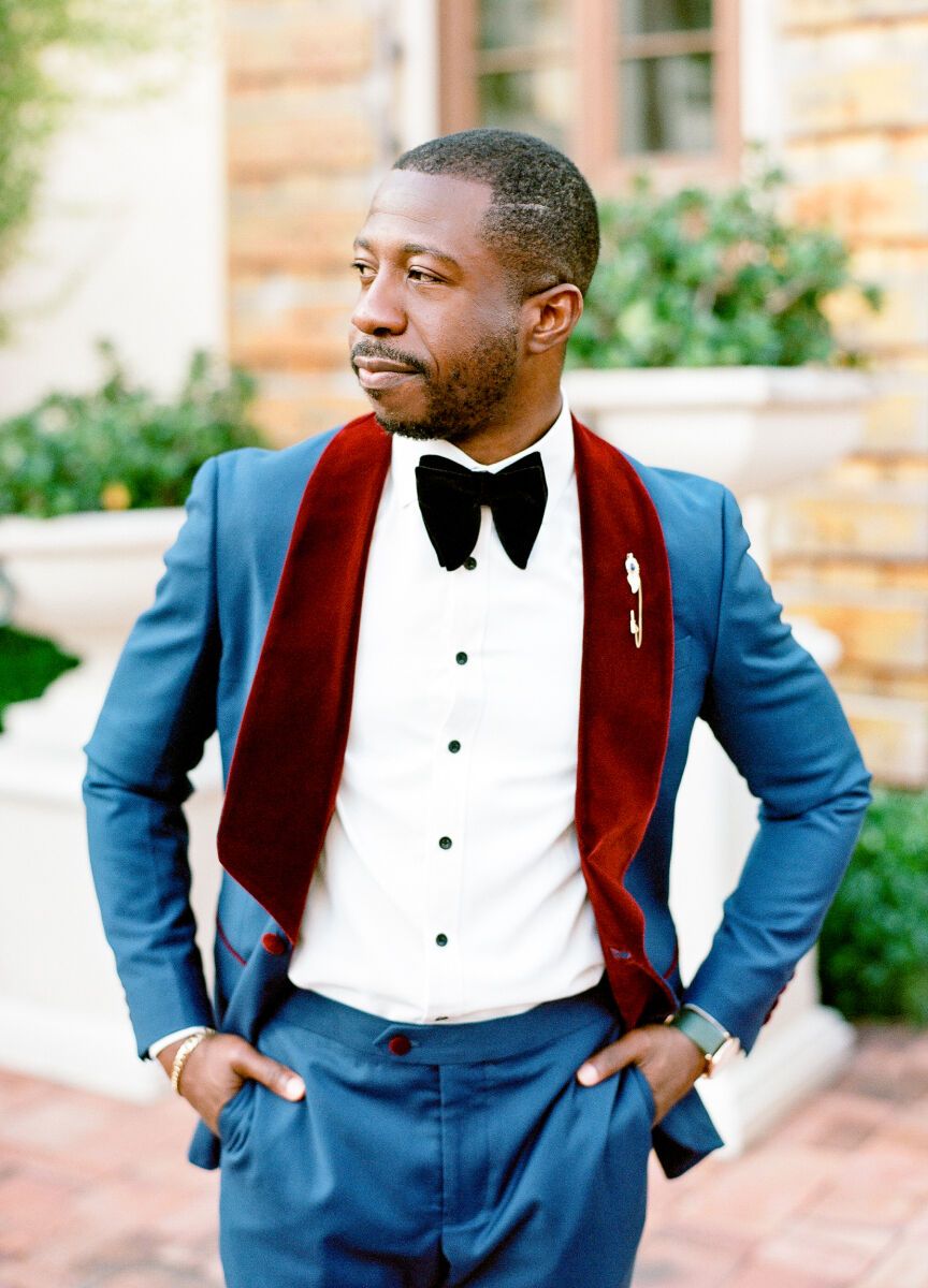 See more blue and red tuxedo groom attire from Michelle and Irhene's modern wedding