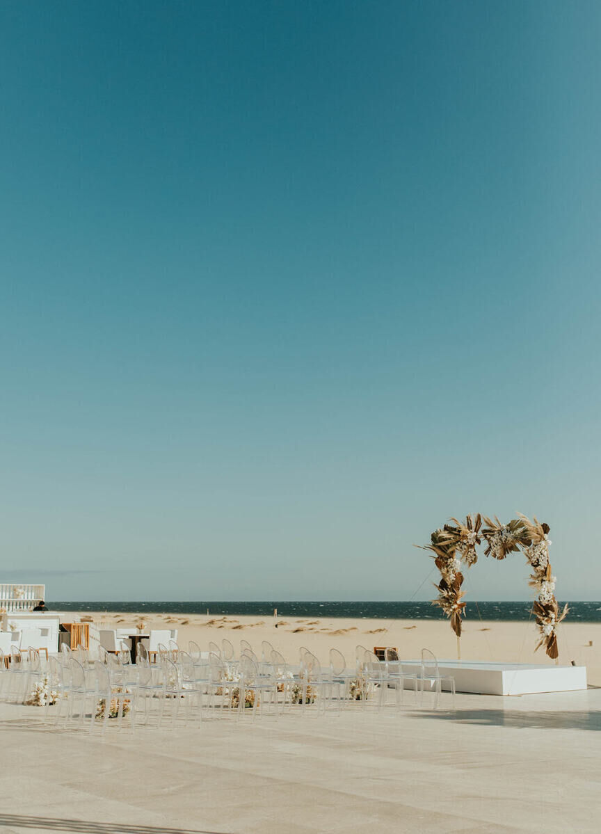 Best Places for a Minimalist Wedding: A sunny outdoor beach ceremony setup at Nobu Los Cabos.