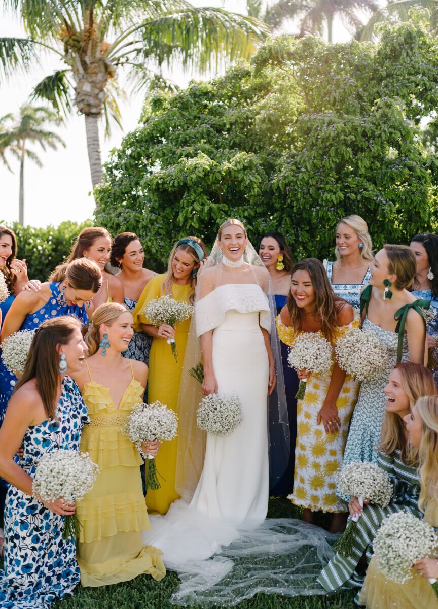 Mismatched bridesmaid dresses: See more assorted patterned unique bridesmaid dresses from Amanda and Kevin's boho wedding