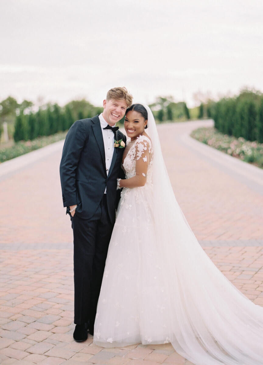 Hunter Woodhall and Tara Davis pose for a portrait at their modern fairytale wedding in McKinney, Texas.