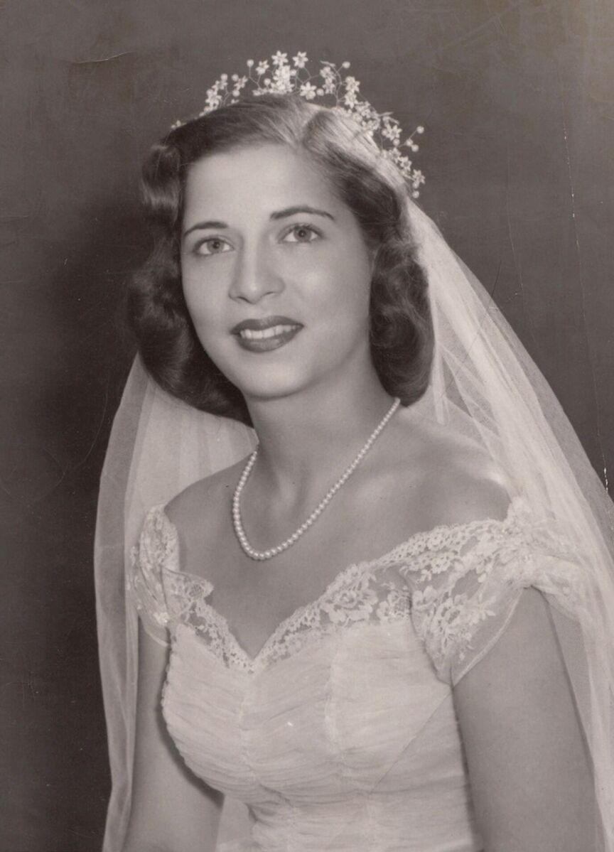 Most Influential Women in History Weddings: Justice Ruth Bader Ginsburg in her wedding gown adorned with a crown, posing for her wedding day portrait 