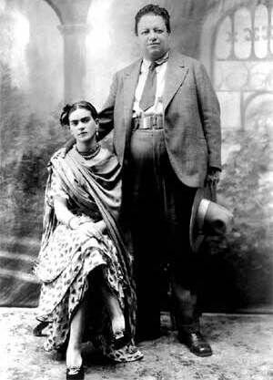 Most Influential Women in History Weddings: Frida Kahlo posing with husband Diego Rivera