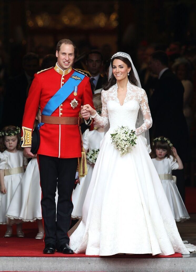 Most Influential Women in History Weddings: Newlywed Katherine Middleton walking out of church hand in hand with husband Prince William