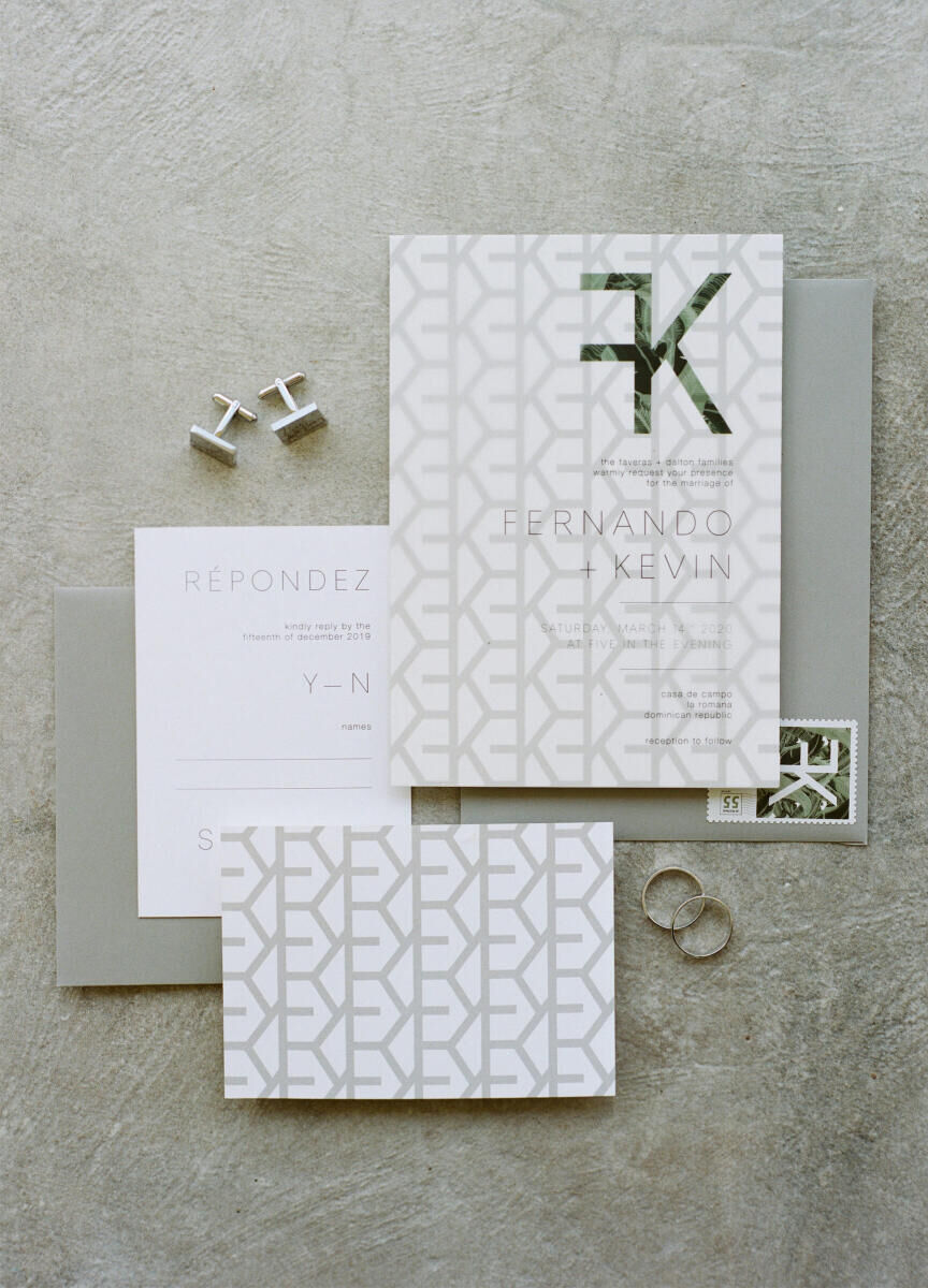 Tropical Wedding: modern, slate palette wedding invitation suite laid out on granite backdrop