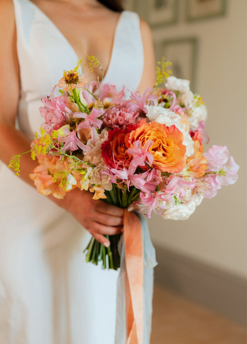 A bridal bouquet honoring the sunset colors of the Tuscan wedding.