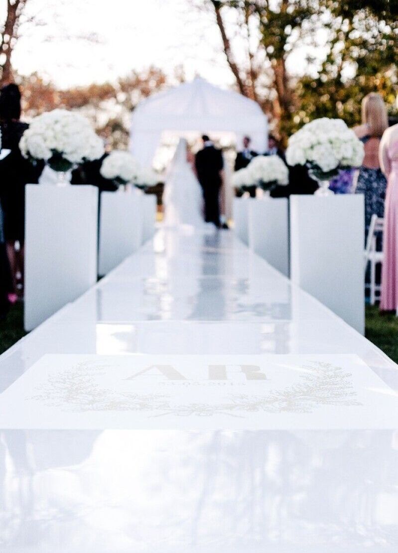 Wedding Aisle: A personalized wedding aisle with the couple's initials.