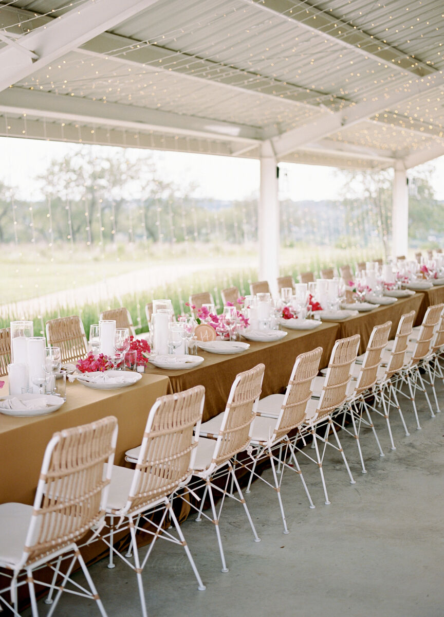 Pink wedding details: Long reception tables set in shades of taupe and fuchsia. 