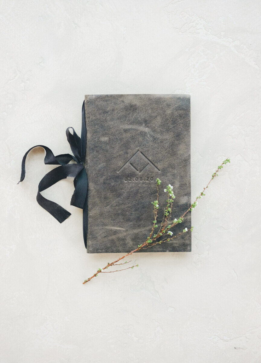 Leather bound textured vow book by wedding invitation designer Bliss & Bone