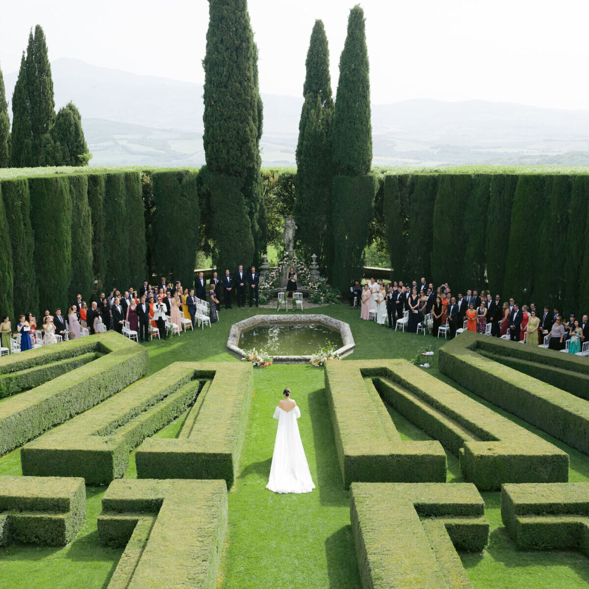 Wedding photographer: Wedding photographer aerial drone shot of wedding ceremony by  Bottega 53