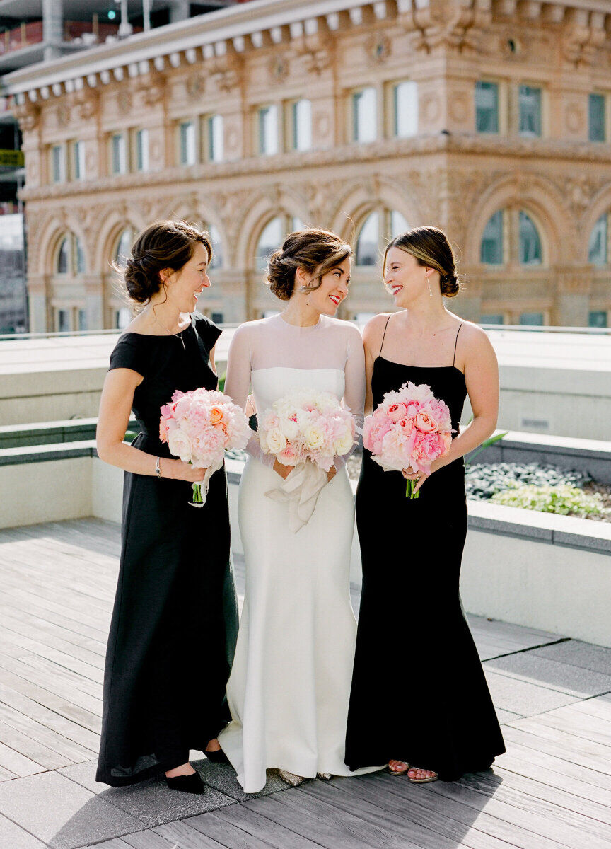 Wedding Venues in California: A bride posing for a photo with her two bridesmaids on a rooftop in San Francisco.