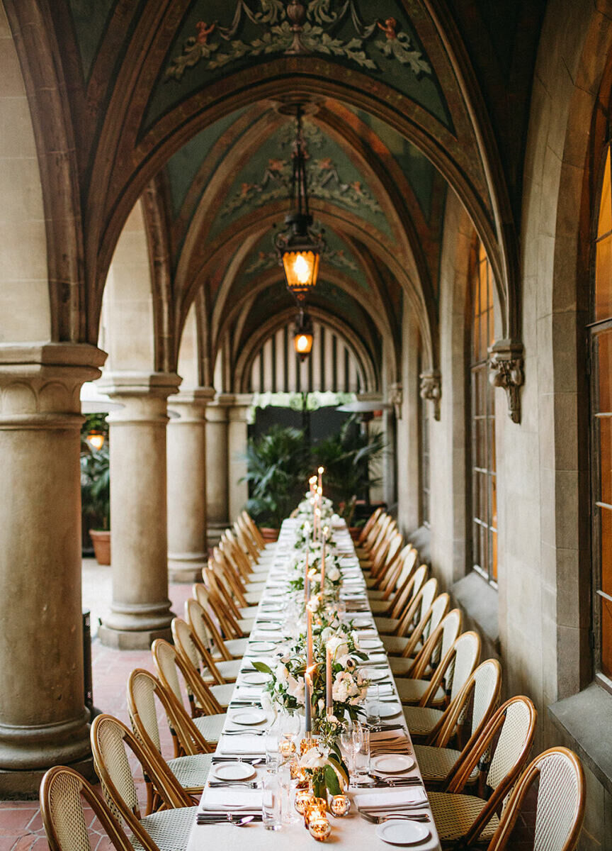 Wedding Venues in California: A long rectangular table in a French chateau-style space in Los Angeles.