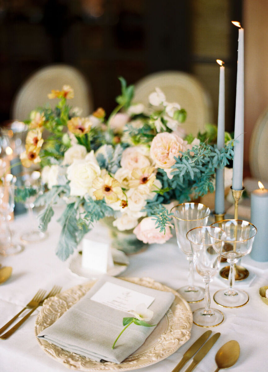 Wedding Website Examples: A seafoam green and peach reception tablescape.