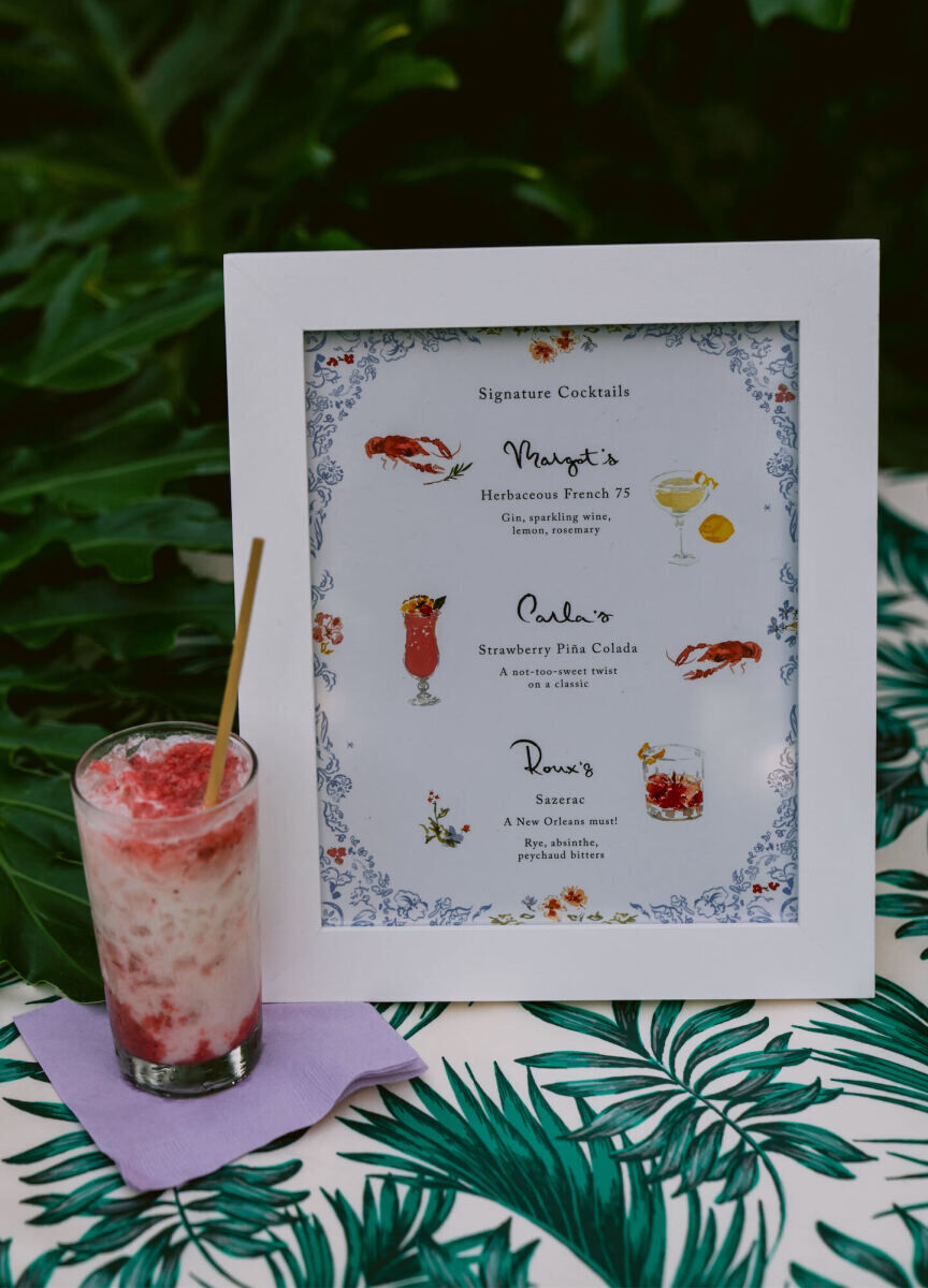 The reception venue of this whimsical wedding also handled all food and drink—including a trio of signature cocktails, which were served with lavender cocktail napkins.