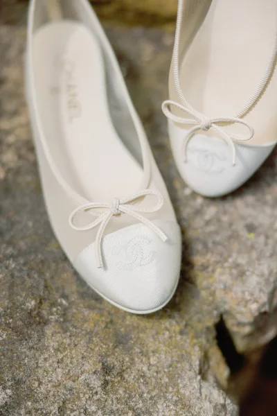 Bridal flats, elegant ivory wedding flats featuring a chic cap toe and refined lines for a clean, timeless look.
