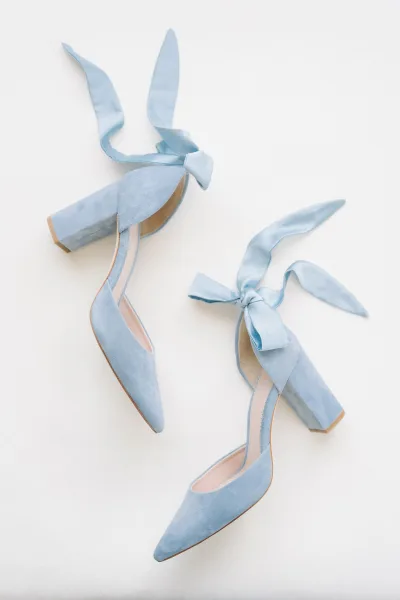 Blue wedding shoes, elegant something blue shoes for the bride, featuring soft ribbon ankle ties for modern charm.