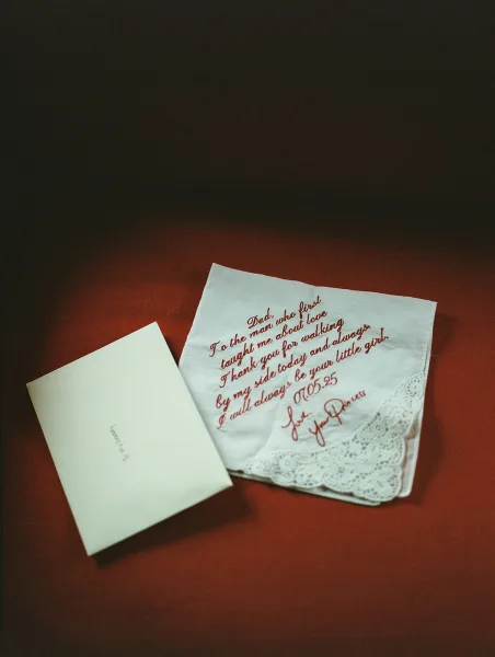 Wedding handkerchief, father of the bride handkerchief with lace trim and embroidered message tucked into an envelope on red fabric