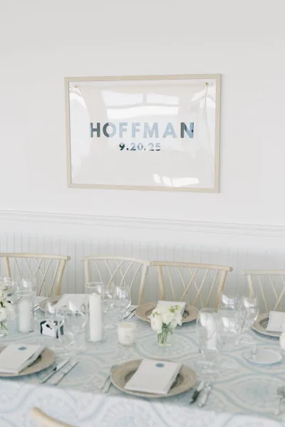 Reception tablescape, a blue and white tablescape anchored by a blue patterned tablecloth for a clean, airy wedding look