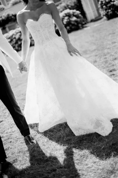 Wedding dress close-up showing a strapless wedding dress with a sweetheart neckline, focusing on the elegant silhouette and refined detail.