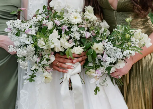 Bridal bouquet, a garden style bouquet of airy blooms with light purple florals, arranged organically and hand-tied.