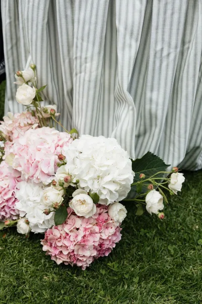 Wedding flowers showcasing hydrangea wedding flowers in a lush pink and white mix, arranged low and meadow-like for an airy, romantic feel.