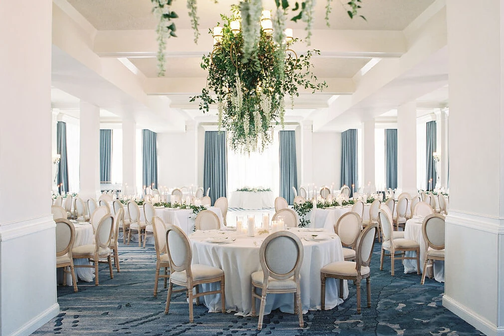 White and blue classic ballroom indoor wedding reception setup