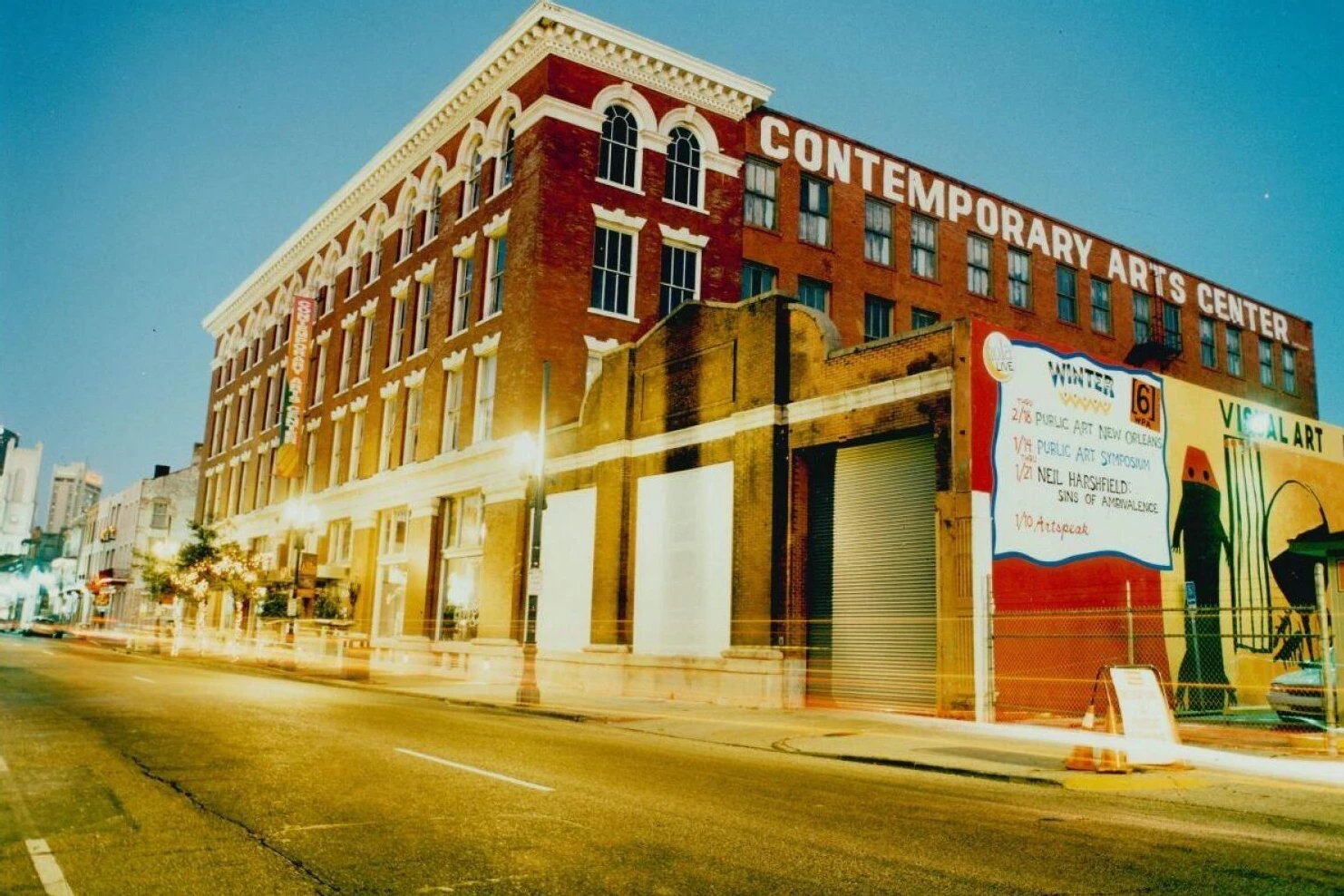 Celebrity Wedding: The outside of the Contemporary Arts Center New Orleans, a brick building with white writing at the top. 