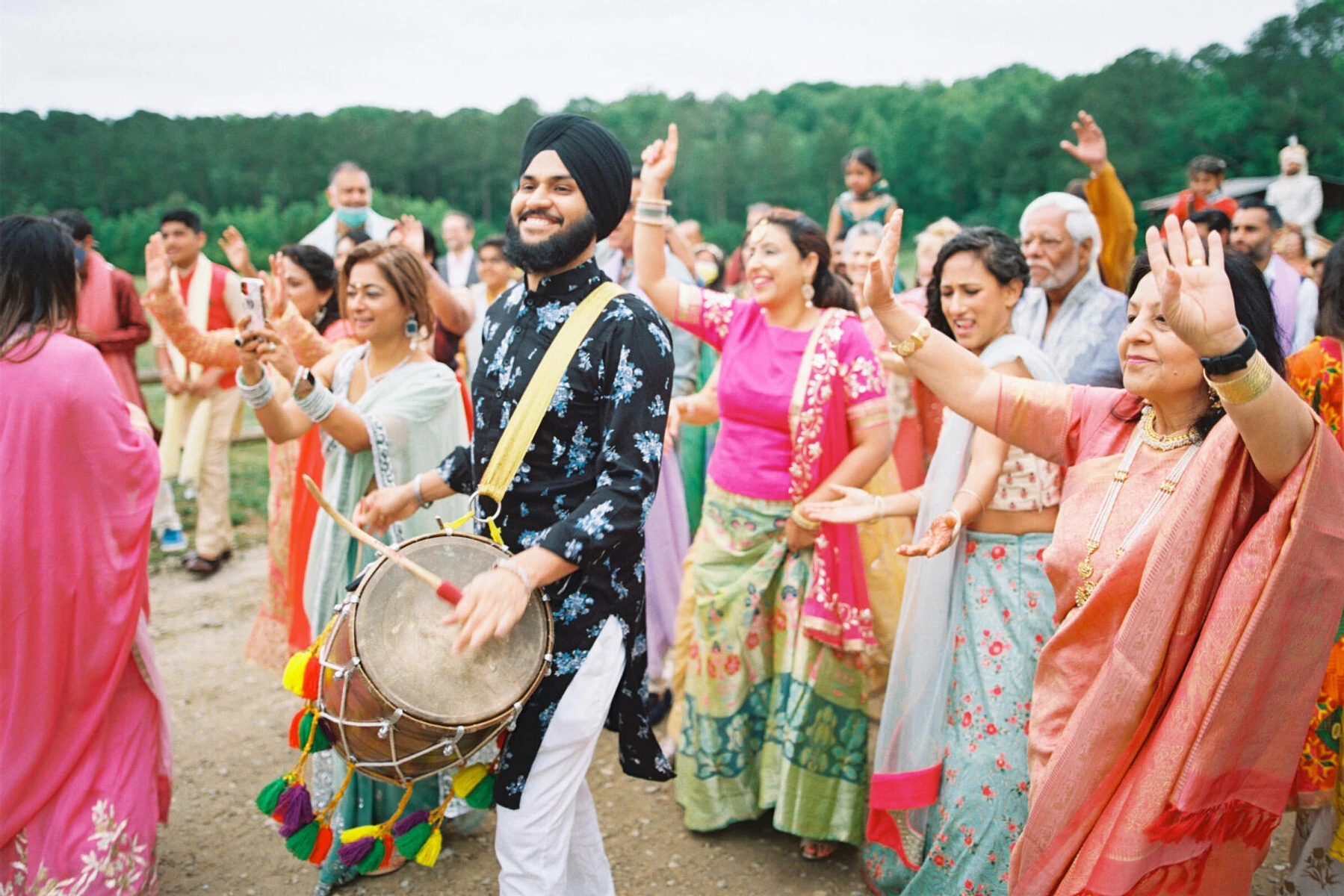 A lively baraat kicked off the wedding day during a weekend-long destination Indian wedding.