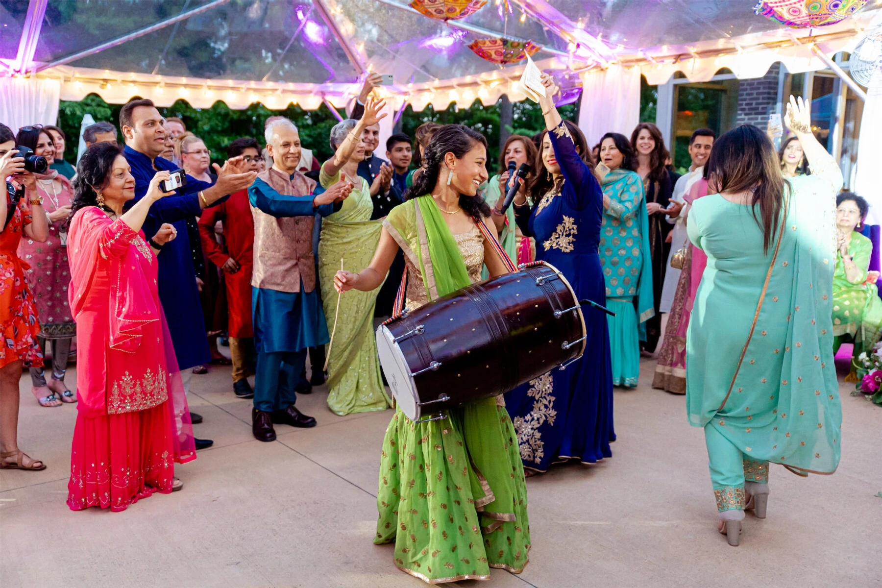 A lively sangeet reception during a destination Indian wedding in Raleigh.