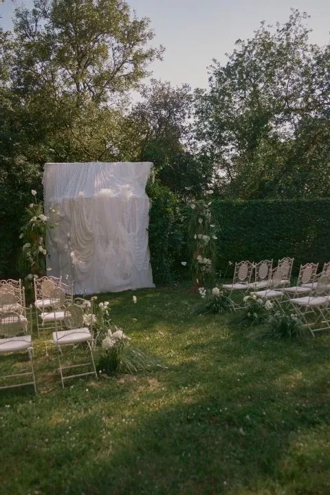 A French Château Wedding Draped, Pooled and Sculpted in Ivory