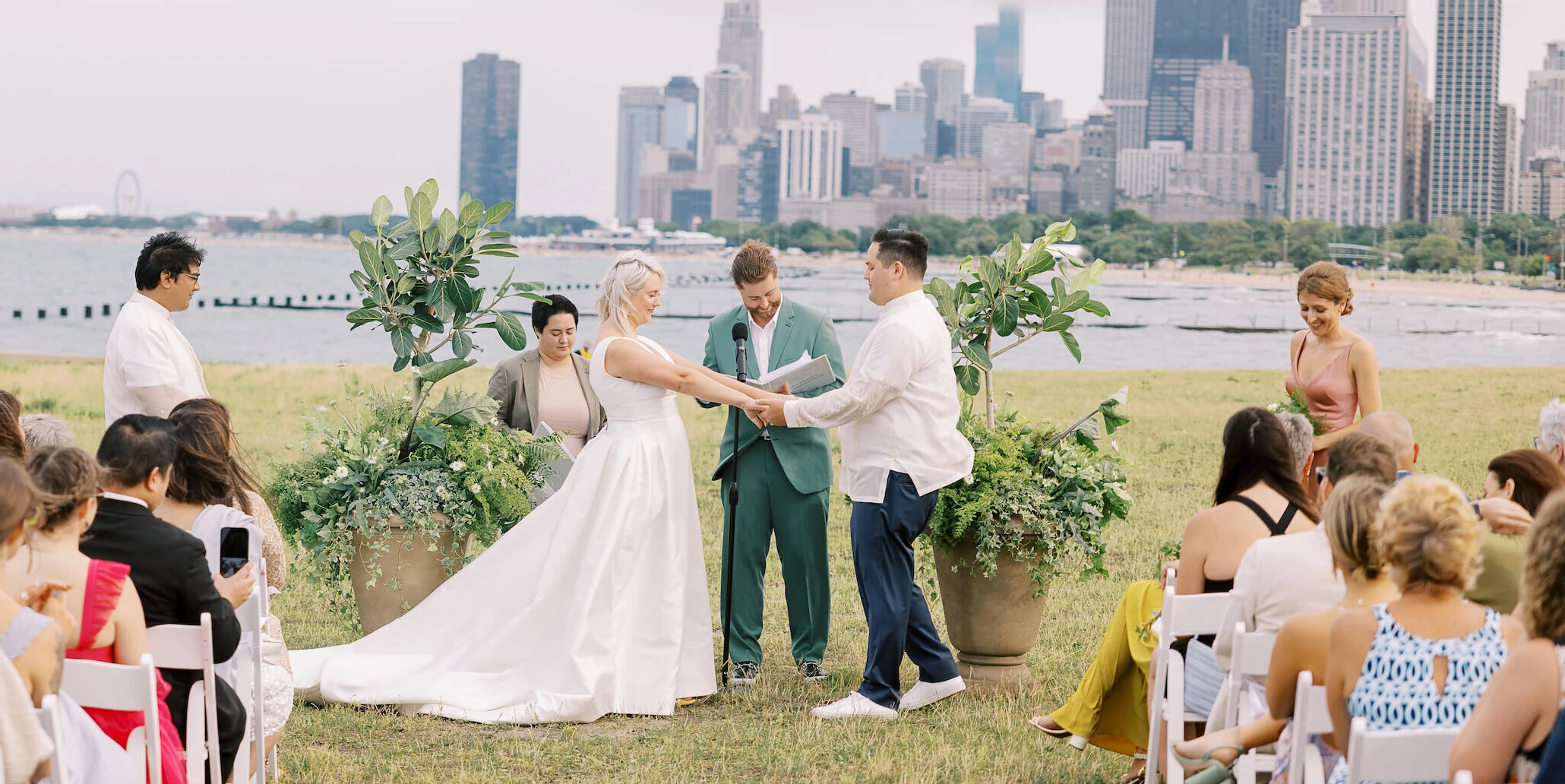 The couple's siblings officiated their enchanted waterfront wedding ceremony in front of Lake Michigan.