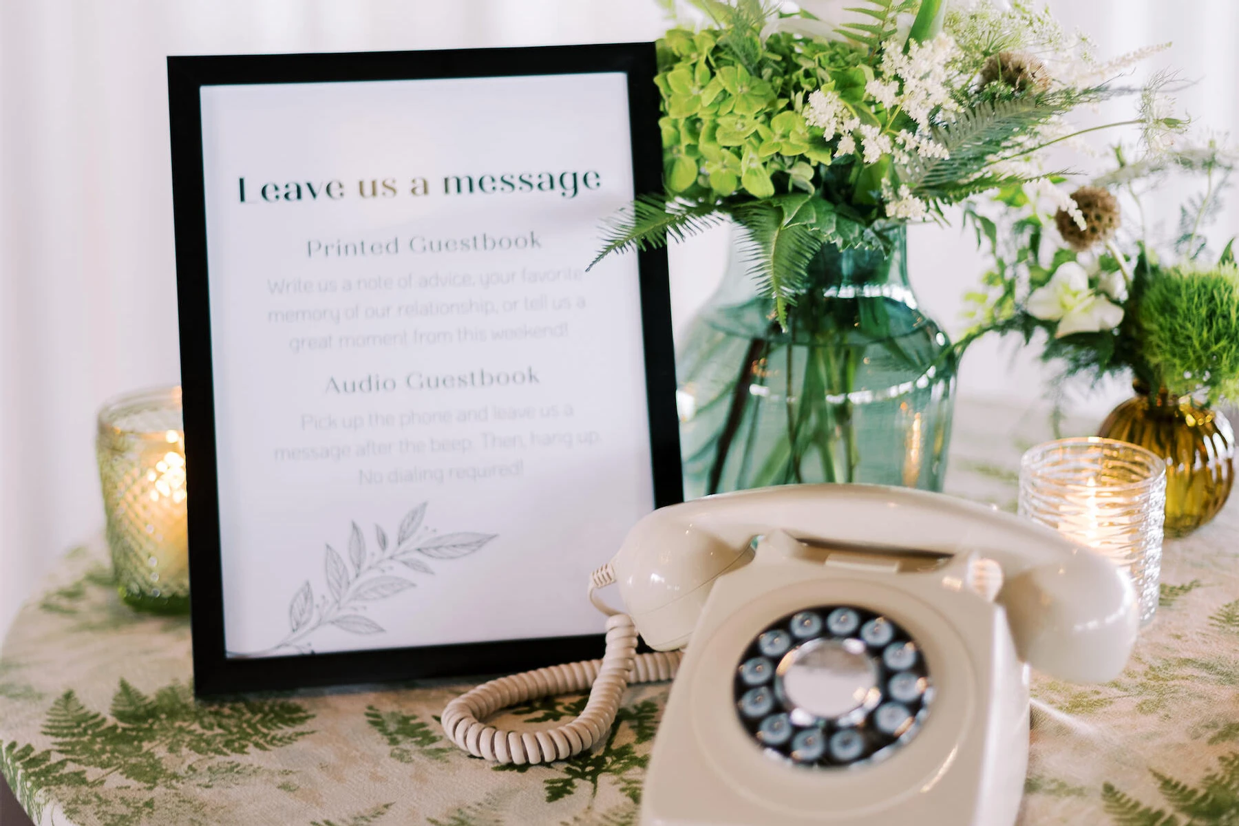 At an enchanted waterfront wedding, guests wrote in a traditional guest book and also left audio messages on a retrofitted phone.