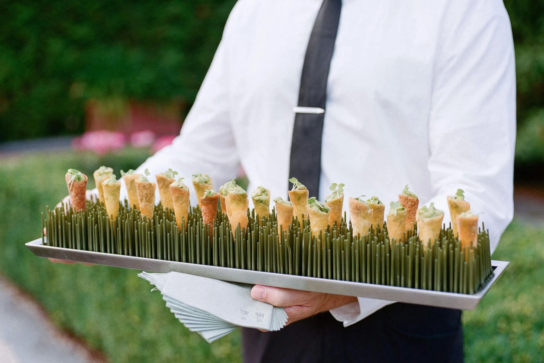 Cone-shaped appetizers were passed during cocktail hour at a Glenmere Mansion wedding.