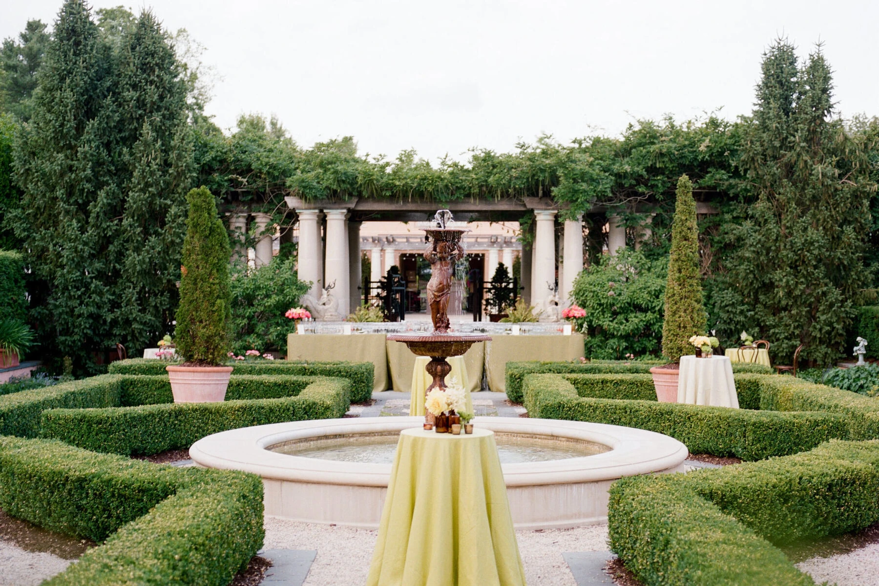 A cocktail hour setup in the garden at a Glenmere Mansion wedding.